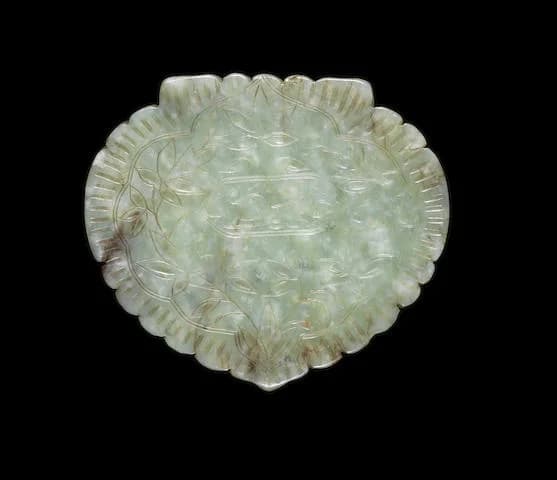 A TIMURID INSCRIBED JADE AMULET