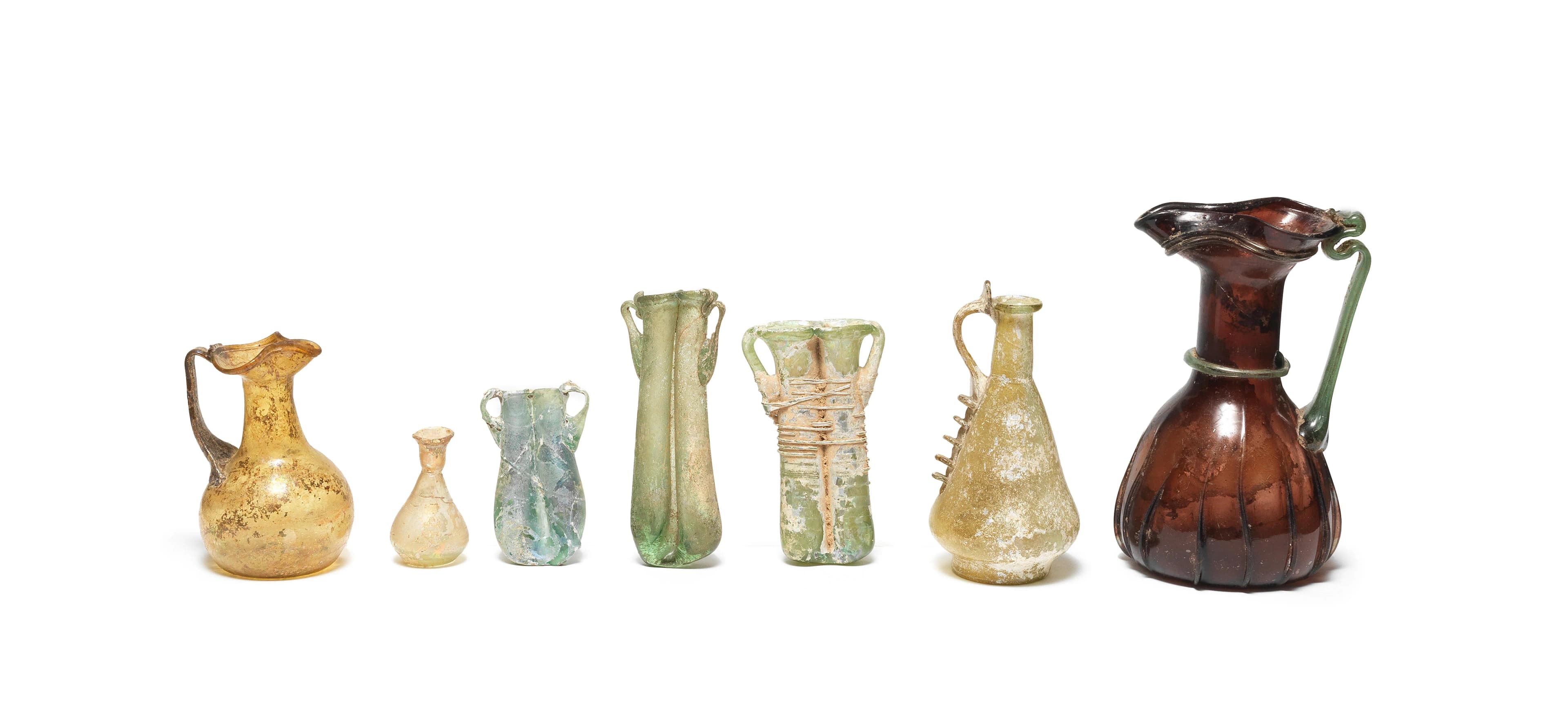 SEVEN ROMAN GLASS VESSELS