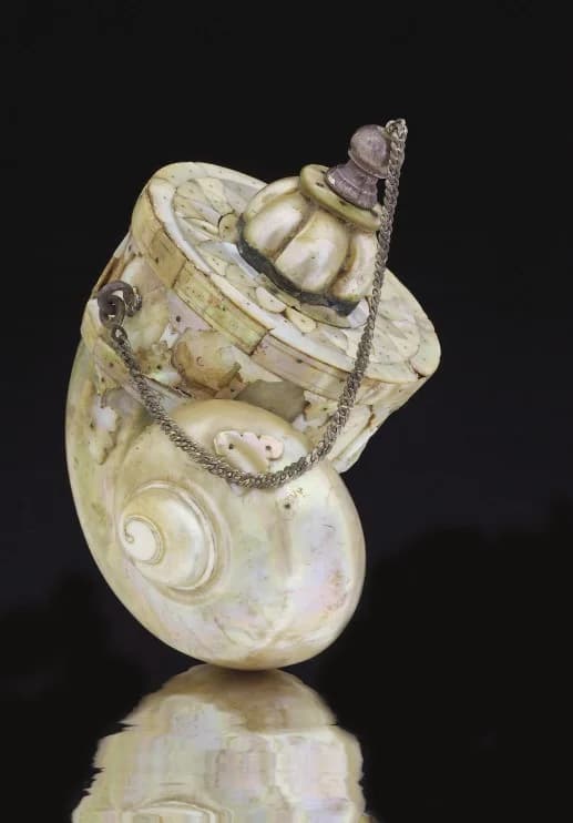 A MOTHER-OF-PEARL POWDER HORNS