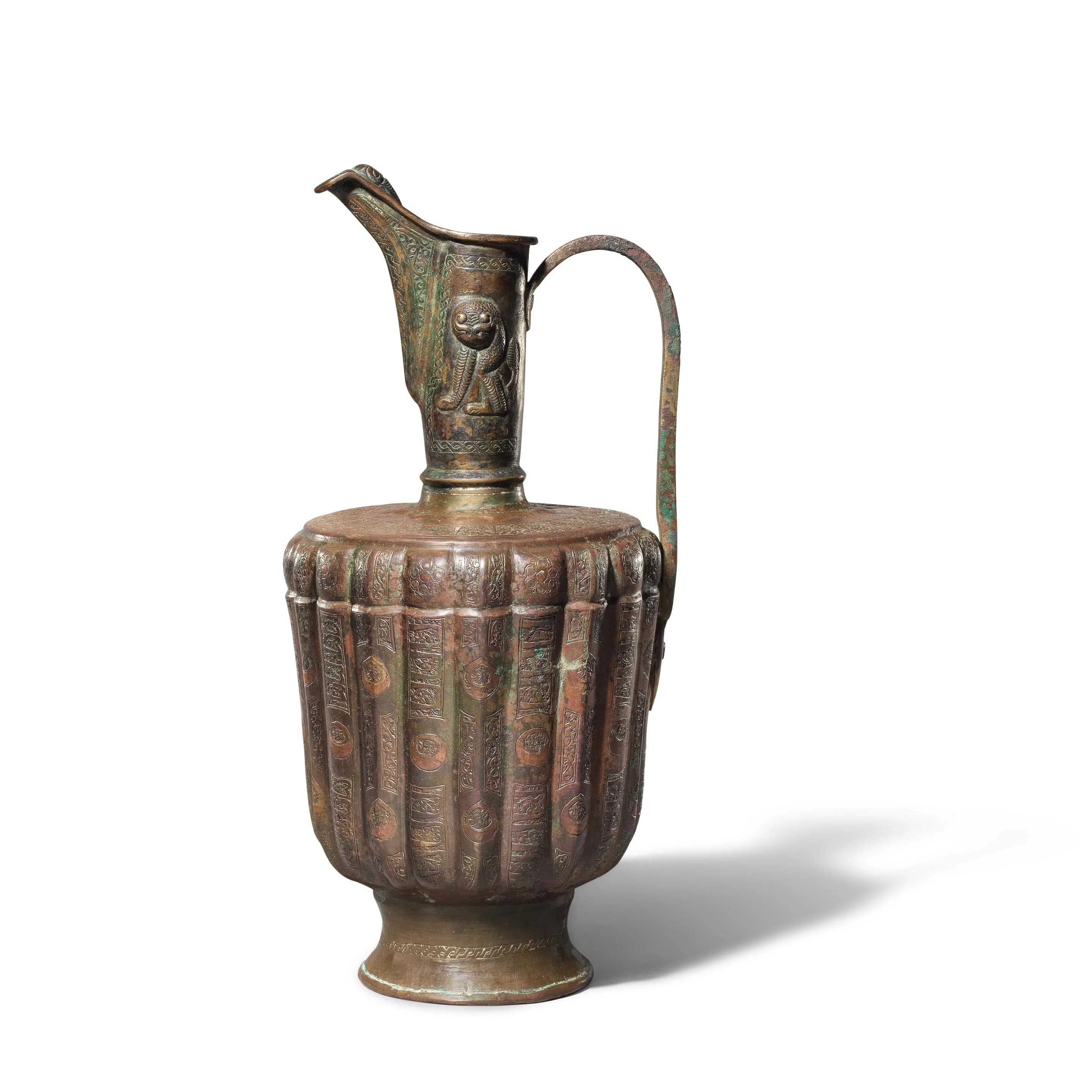 A KHORASAN SILVER INLAID BRONZE