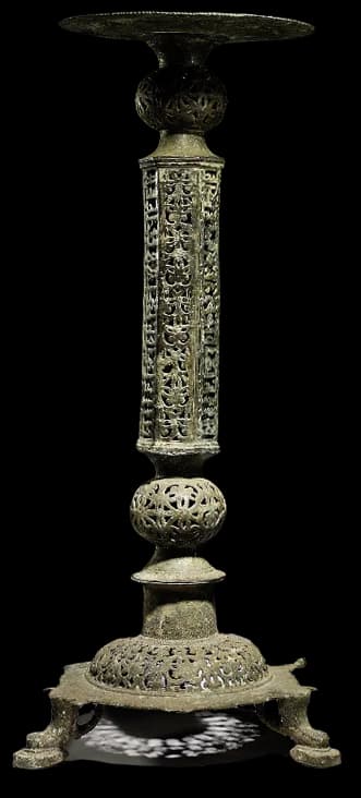 A KHORASSAN PIERCED BRONZE LAMPSTAND