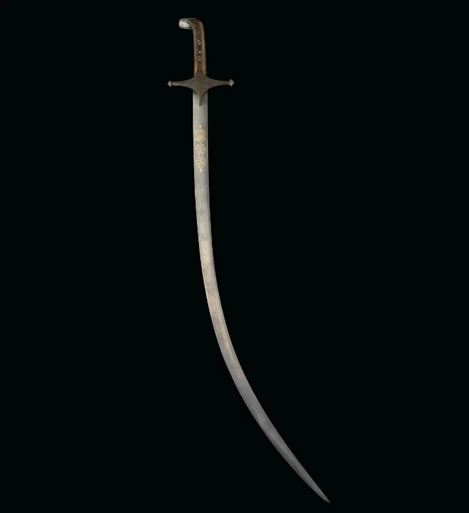 A FINE WATERED-STEEL CURVED SWORD (SHAMSHIR)
