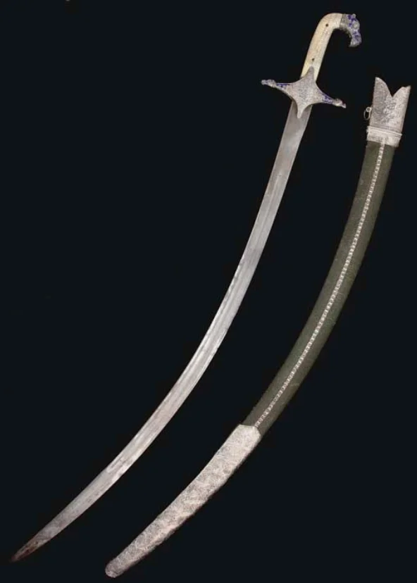 A DAMASCENED STEEL SWORD