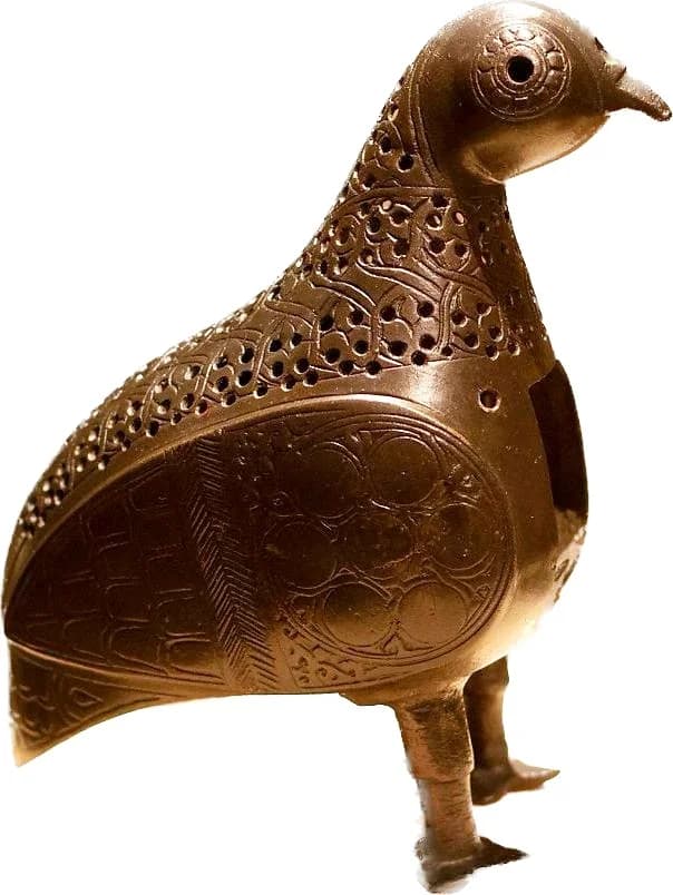 A KHORASAN OPENWORK BRONZE INCENSE BURNER IN THE FORM OF A BIRD