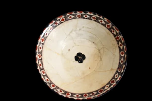 A SAMARKAND POTTERY CONICAL BOWL