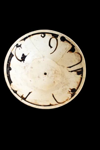 A NISHAPUR CALLIGRAPHIC BOWL