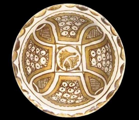 AN ABBASID POLYCHROME LUSTRE POTTERY BOWL