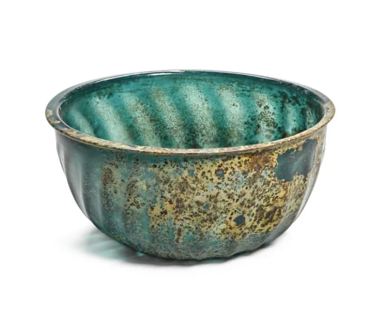 AN INTACT MOULD-BLOWN BLUE GLASS BOWL