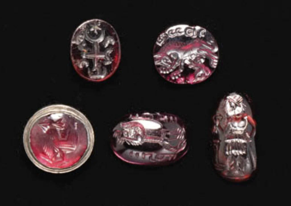 FIVE SASSANIAN GARNET RING STONES