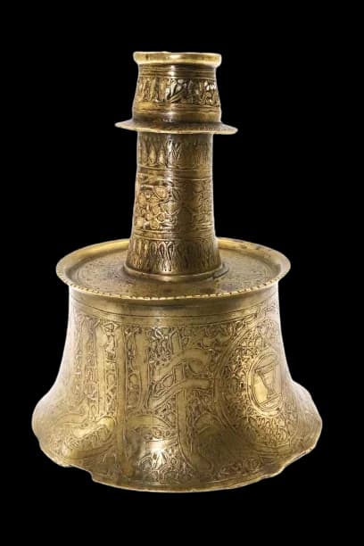 AN EXTREMELY RARE MAMLUK CALLIGRAPHIC BRASS SILVER INLAID CANDLESTICK